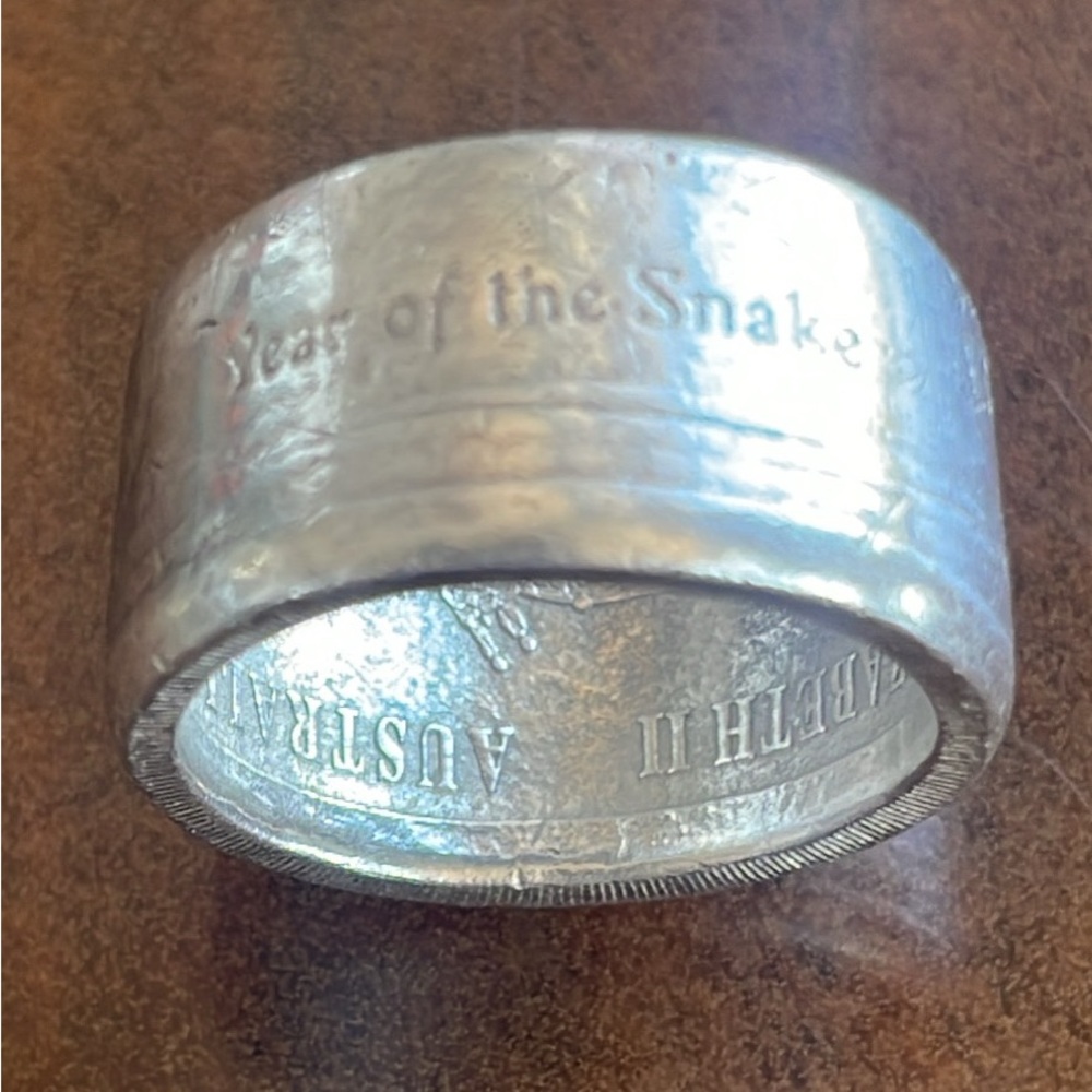 A Half Dollar Coin Ring. 
(.999 Fine Silver)